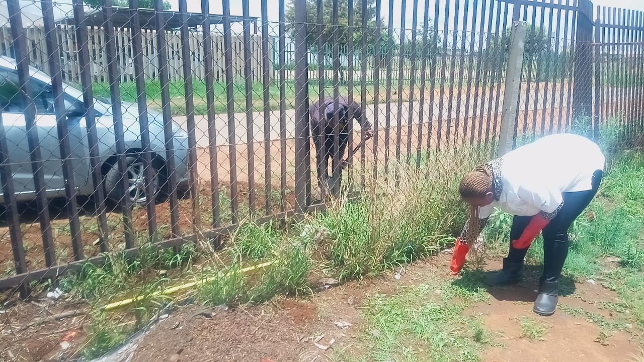 Men reorganising and cleaning the venue